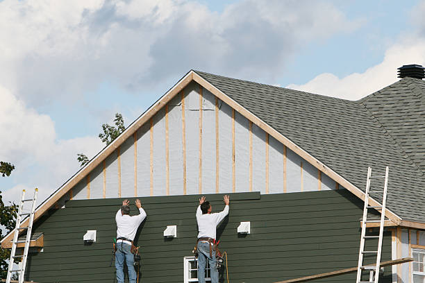 Professional Vinyl Siding technician working in Newcomerstown, OH
